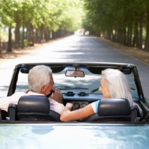 Older couple riding in car